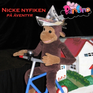 Fotografi av Nicke Nyfiken gosedjur som cyklar